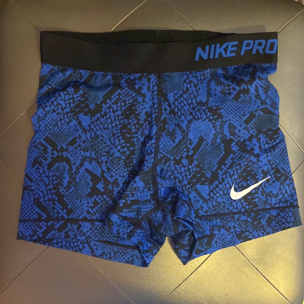 Blue snake print Nike pros